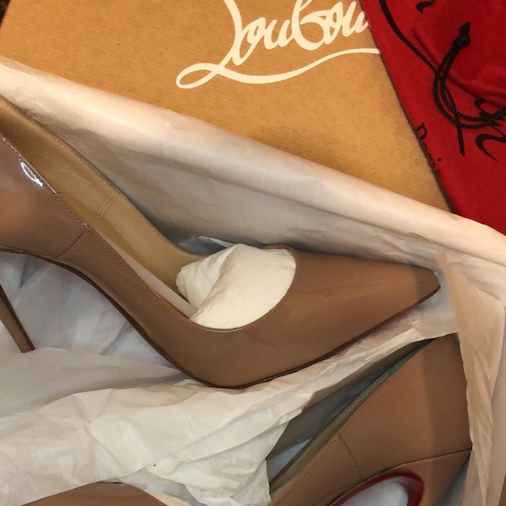 Brand new Christian Louboutin red bottoms